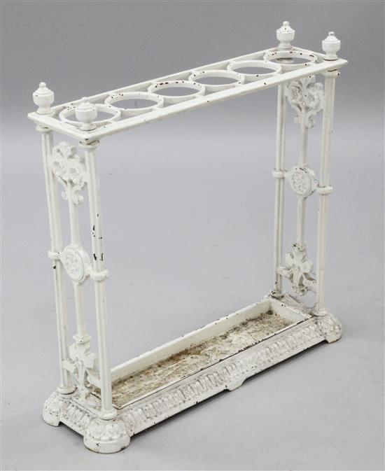 A late Victorian white painted cast iron stick stand, 2ft